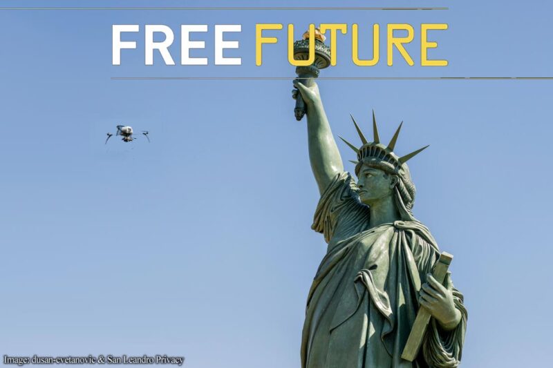 A drone flying in front of the Statue of Liberty
